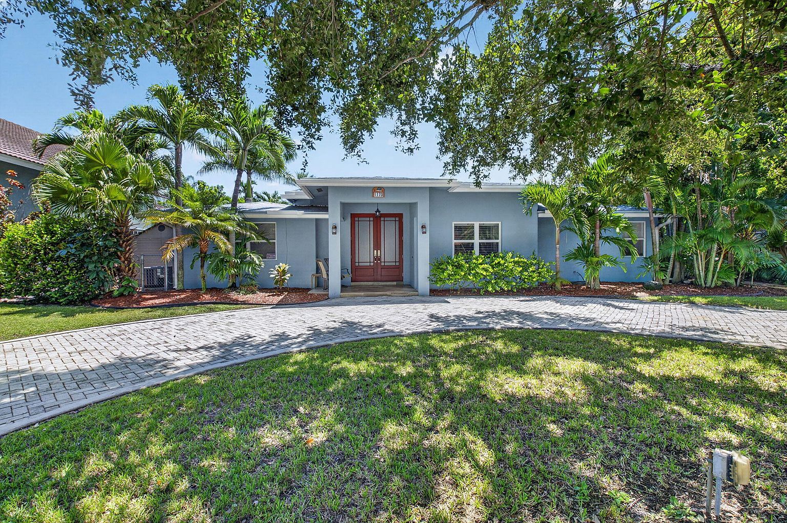 Front exterior of 1170 SW 21st Street, a Boca Raton pool home for sale